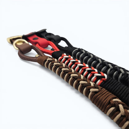 Collection of braided weatherproof dog collars in various colors on a white background