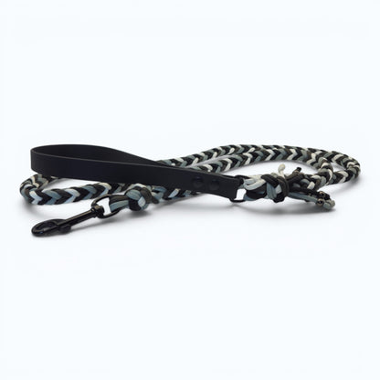 Dog leash with black and gray pattern on a white background
