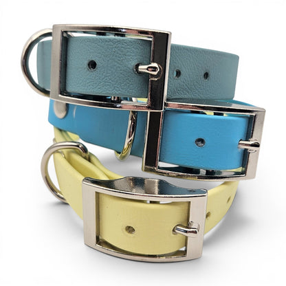Ponies and Pups adjustable dog collar in teal, blue, and yellow BioThane with silver buckle. Waterproof and handmade.