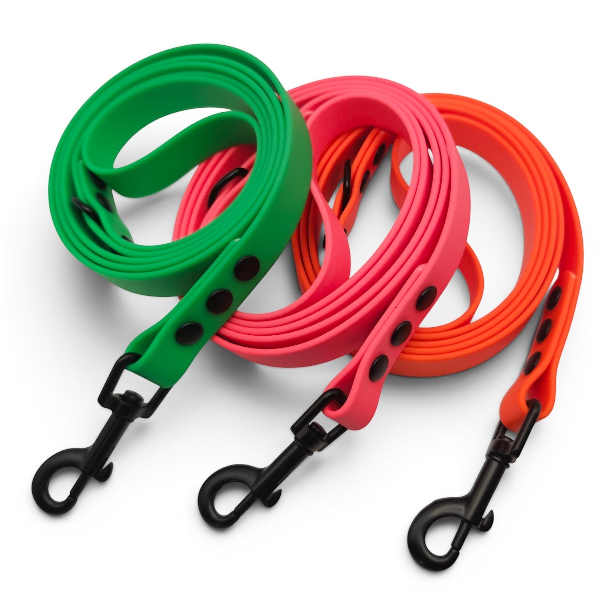 Ponies and Pups green, pink, and orange BioThane dog leads with black hardware. Waterproof and stink-proof.