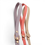 Ponies and Pups BioThane dog leads in lilac, coral, and beige with gold hardware. Waterproof and durable.