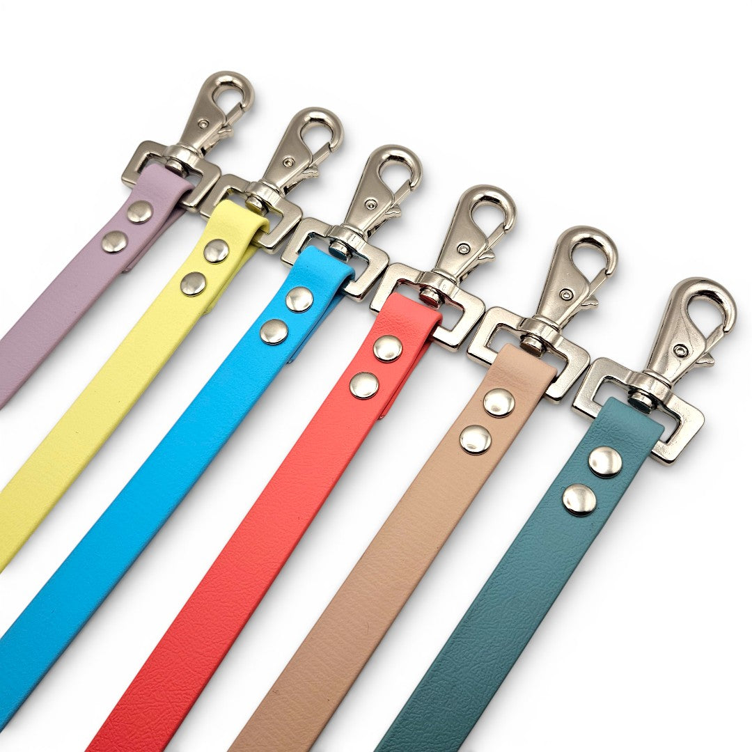 Handmade waterproof BioThane adjustable rug fillet strings, made to order in 21+ colours (shown in a range of bright shades).