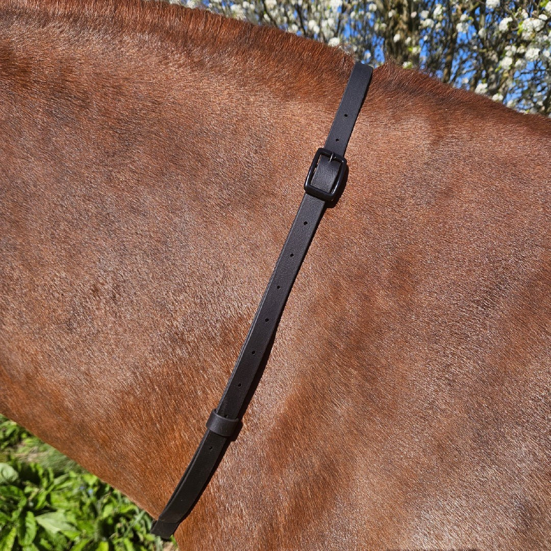 Ponies and Pups black BioThane adjustable neck strap on a brown horse. Waterproof and stink-proof.