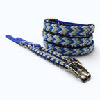 Ponies and Pups Wilmington handmade braided dog collar in blue, grey, and white paracord with a blue BioThane backing and gold hardware.