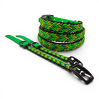 Ponies and Pups handmade braided dog collar in green, yellow, and black BioThane and rope. Weatherproof and durable.