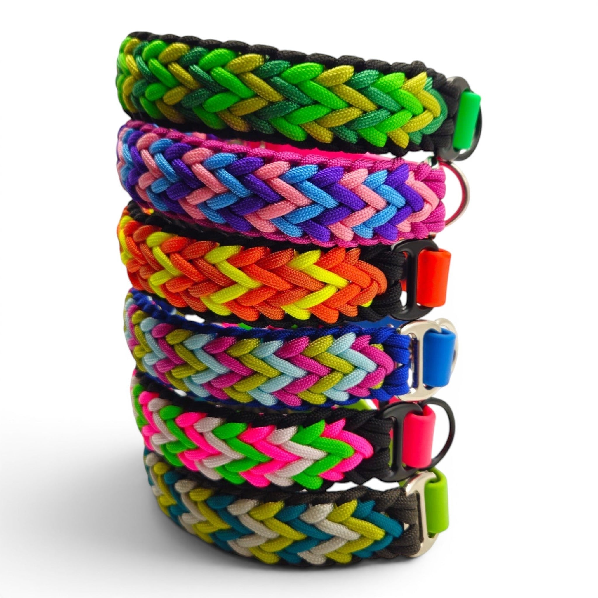 Handmade braided paracord dog collars with a BioThane base, made to order in 21+ curated colourways (shown in a range of bright colours).