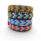 Ponies and Pups Wilmington handmade braided dog collars in brown, grey, blue, and red colorways. Weatherproof BioThane & rope.