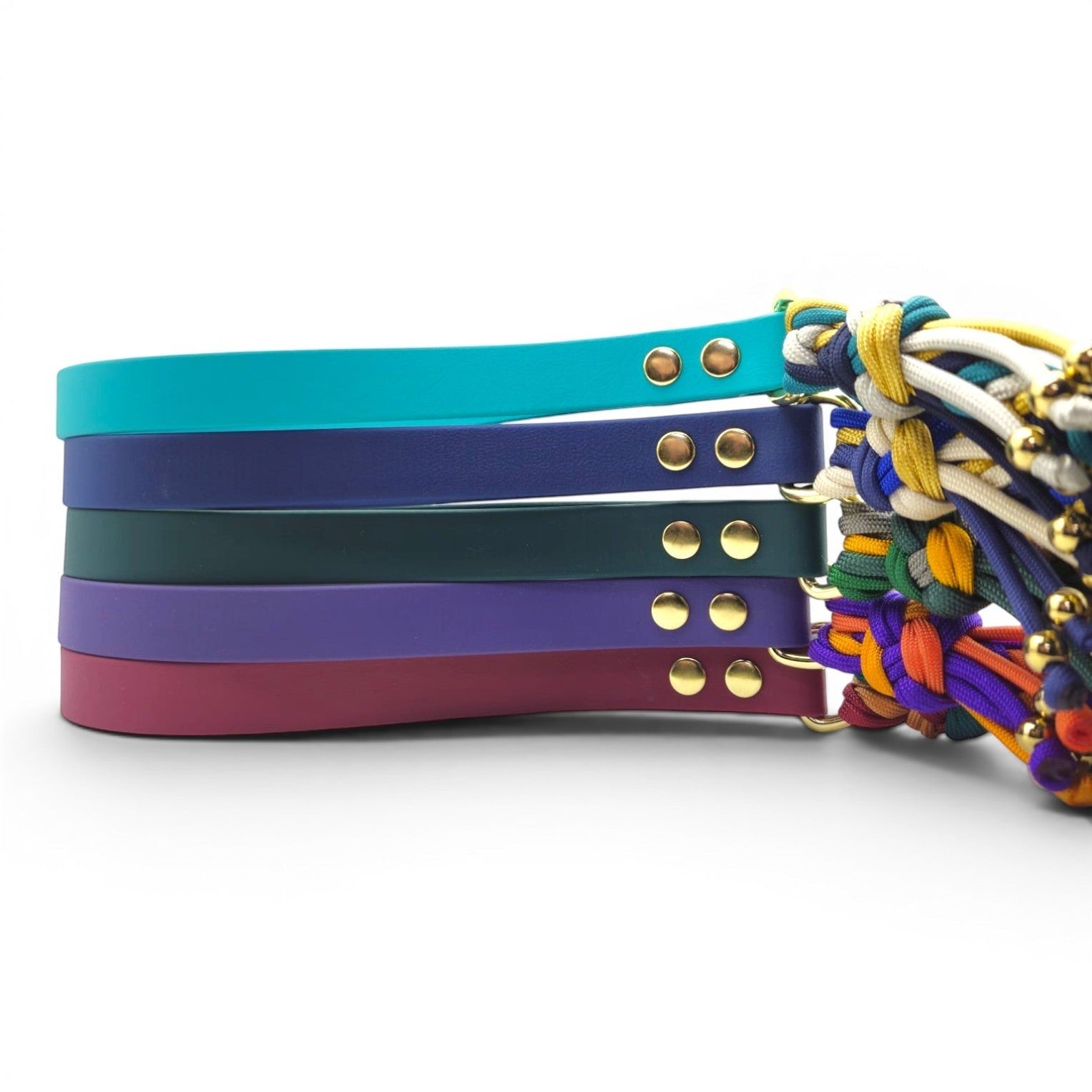 Ponies and Pups handmade braided dog lead with teal, navy, forest green, purple, and burgundy BioThane handles and colourful paracord rope.