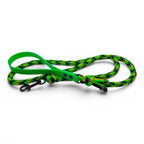 Ponies and Pups handmade braided dog lead with green BioThane handle and black, green, and yellow paracord. Features a metal snap hook.