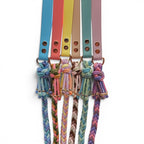 Ponies and Pups handmade braided dog leads in various colors, featuring BioThane handles and paracord lengths.