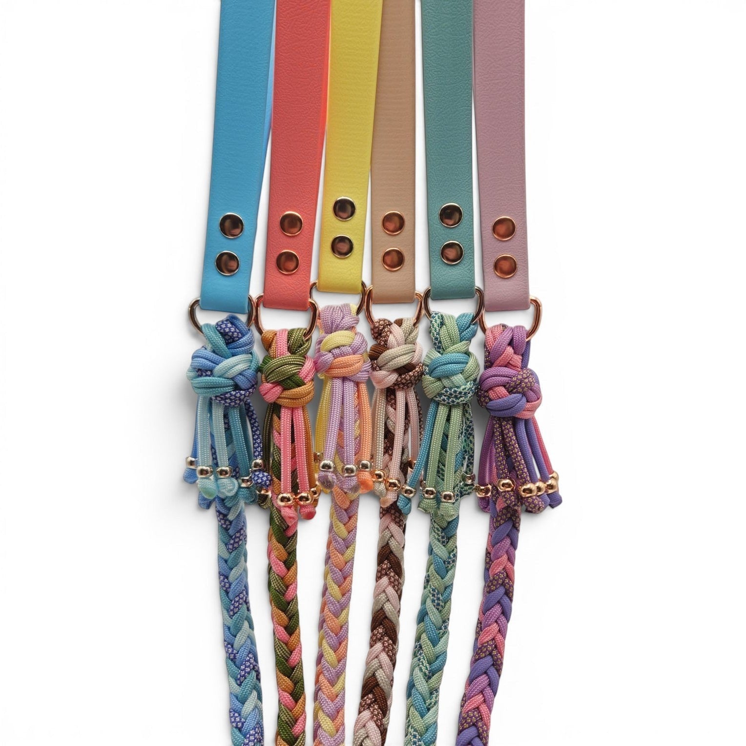 Ponies and Pups handmade braided dog leads in various colors, featuring BioThane handles and paracord lengths.