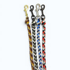 Ponies and Pups handmade braided dog leads in brown/yellow, grey/black, blue/grey, and red/black/grey with metal snap hooks.