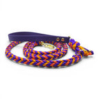 Ponies and Pups Wilmington braided dog lead with purple BioThane handle and orange/purple rope. Features brass snap hook.