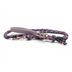 Ponies and Pups Wilmington handmade braided dog lead in purple, pink, and blue with a lilac BioThane handle and rose gold snap hook.