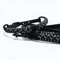 Ponies and Pups Firle dog collar with black BioThane and grey/black braided paracord detail.