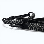 Ponies and Pups Firle dog collar with black BioThane and grey/black braided paracord detail.