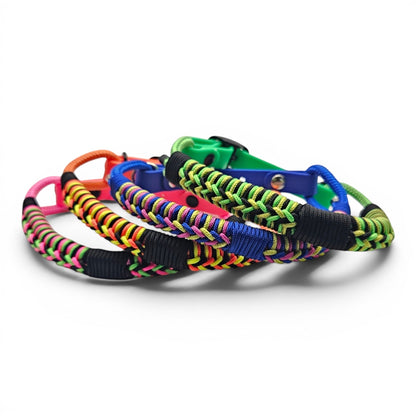 Ponies and Pups Firle dog collar with braided paracord in neon yellow, green, pink, blue, and orange on a weatherproof BioThane strap.