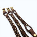Ponies and Pups Firle dog collar with brown braided paracord and brass hardware. Weatherproof BioThane strap.
