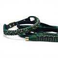 Ponies and Pups Firle dog collar in dark green with braided paracord and gold hardware. Weatherproof BioThane strap.