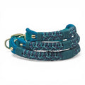Ponies and Pups Firle dog collar in teal and purple braided paracord with teal BioThane strap and gold hardware.