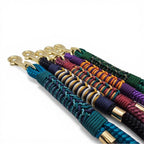 Ponies and Pups Firle dog lead with braided rope in teal, navy, burgundy, purple, orange, and green, featuring gold hardware.