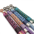 Handmade rope and paracord dog leads with BioThane handles, made to order in 17+ curated colourways (shown in purple, peach, blue and teal).