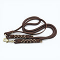 Ponies and Pups Firle dog lead in dark brown with braided detail and brass hardware. Features a BioThane handle and PPM rope.