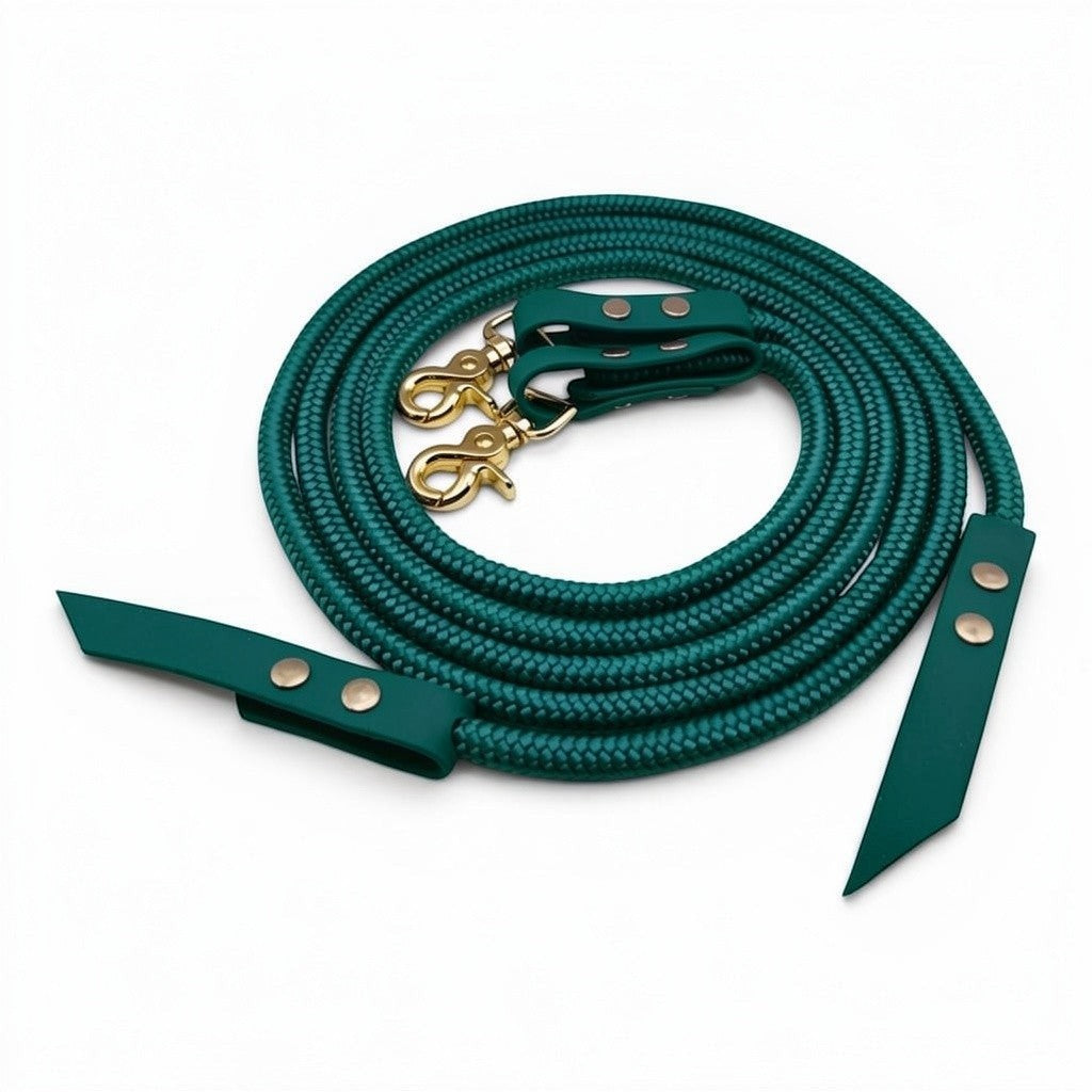 Ponies and Pups emerald green rope split reins with durable BioThane ends and gold swivel clips for horse riding.