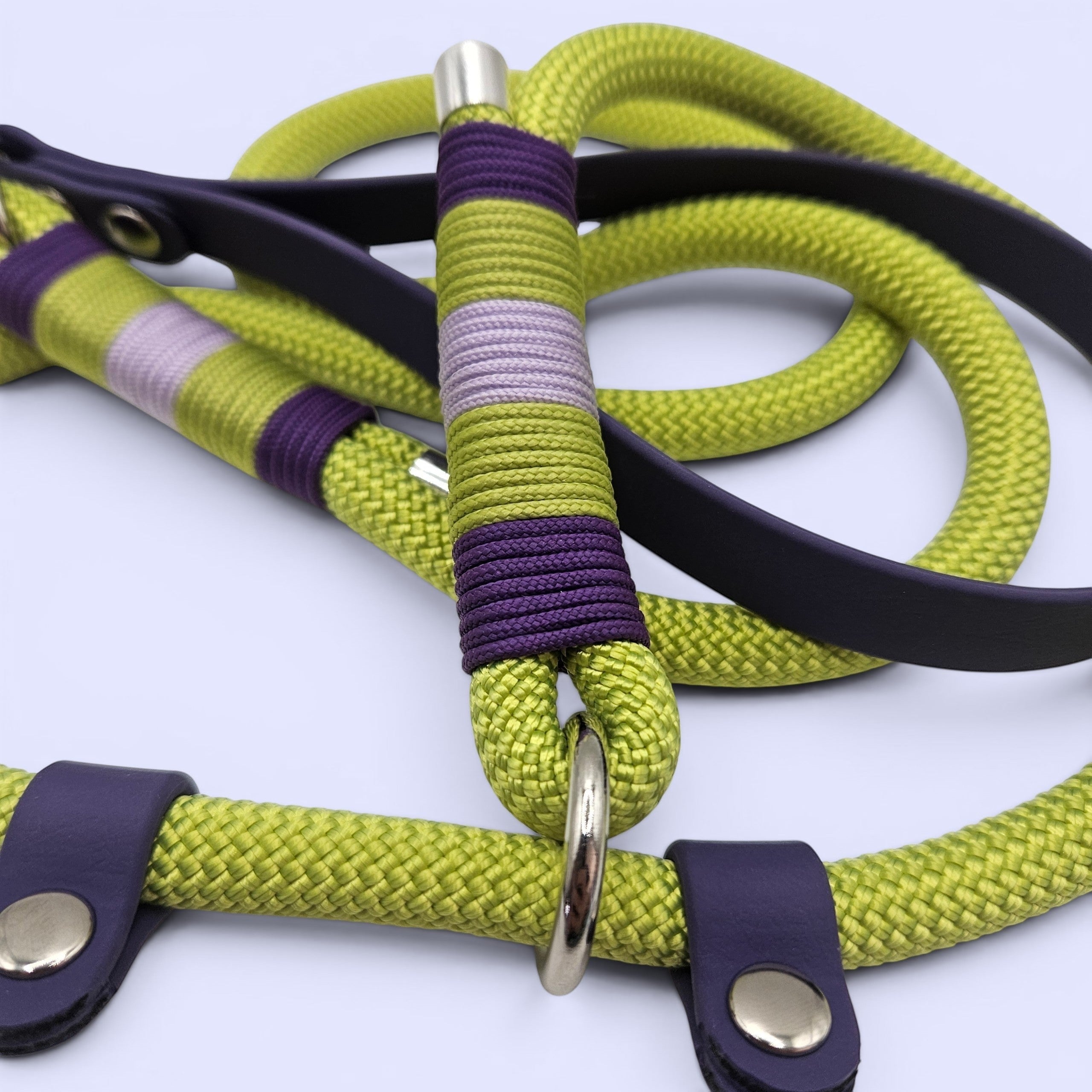 Ponies and Pups luxury lime green rope slip lead with purple BioThane handle, paracord whipping, and metal end caps.