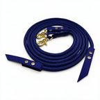 Ponies and Pups navy blue rope split reins with durable BioThane ends and gold swivel clips for horse riding.