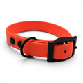 Ponies and Pups orange BioThane waterproof dog collar with black hardware, adjustable and handmade.