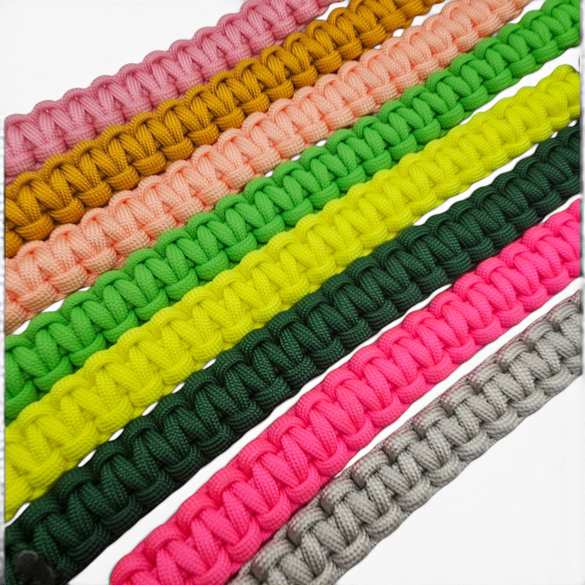 Ponies and Pups custom paracord browband samples in various vibrant colours including pink, green, yellow, and grey.