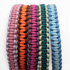 Ponies and Pups custom two-tone woven paracord browbands in various vibrant colour combinations for equestrian tack