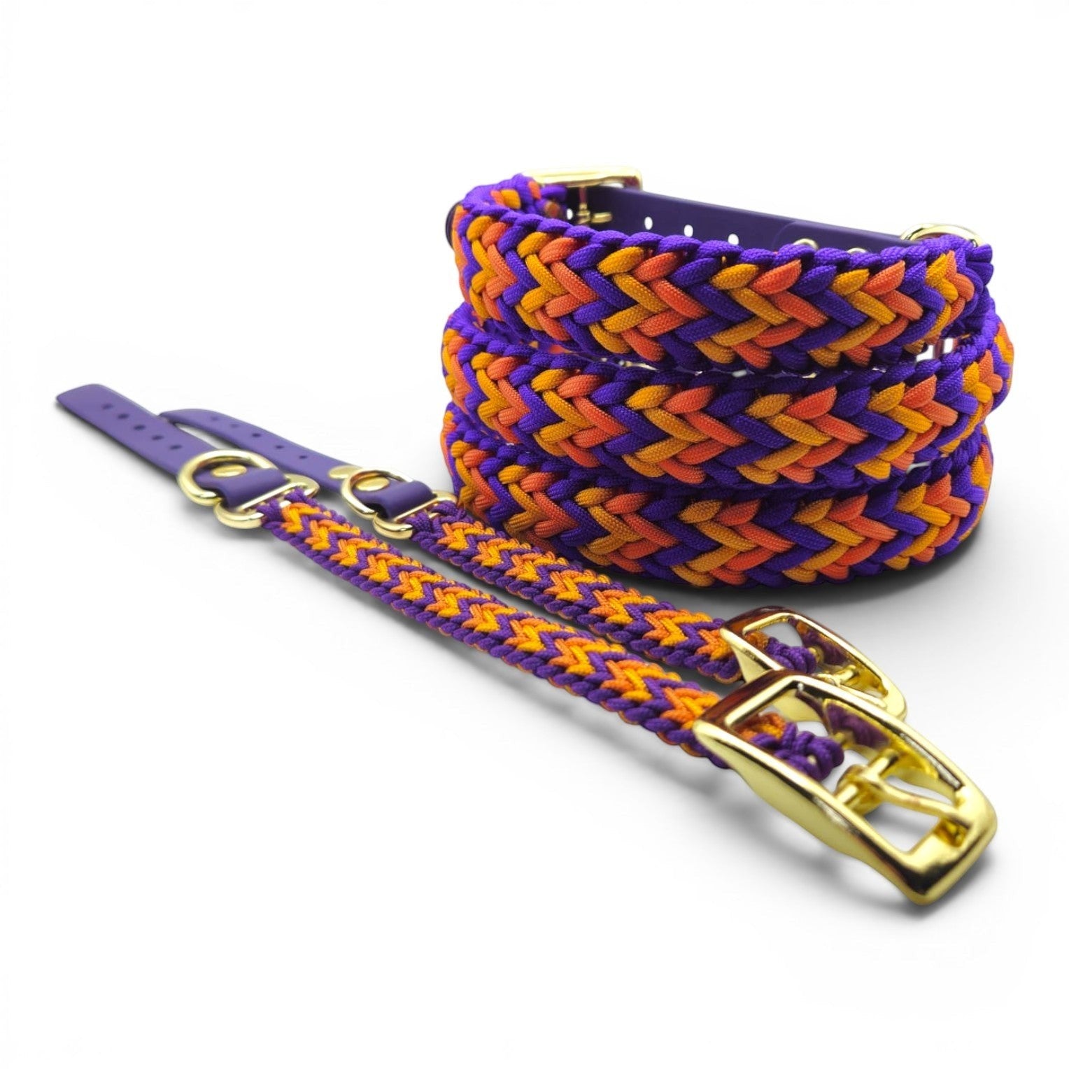Ponies and Pups Wilmington handmade braided dog collar in purple, orange, and gold. Weatherproof BioThane and rope.
